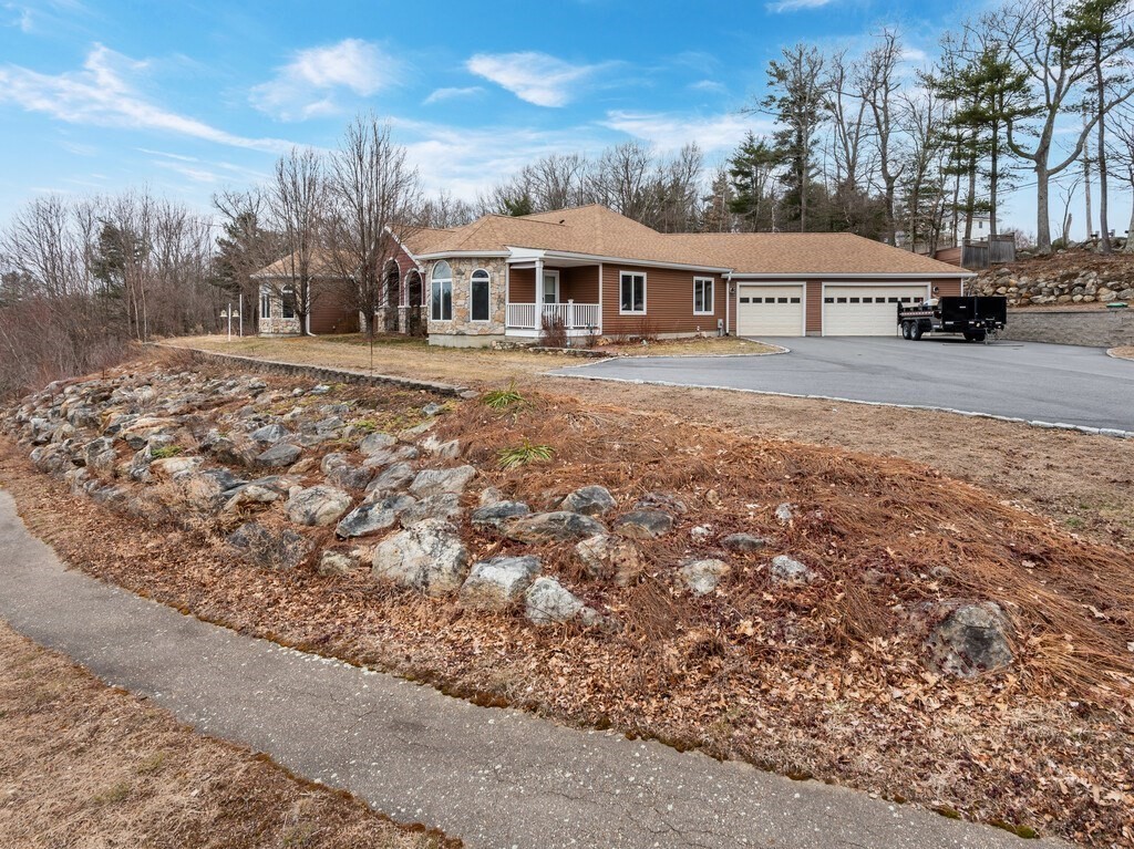 4 Thurston Hill Road Rutland, MA 01543 - Photo 4 of 35 a view of house with outdoor space and swimming pool