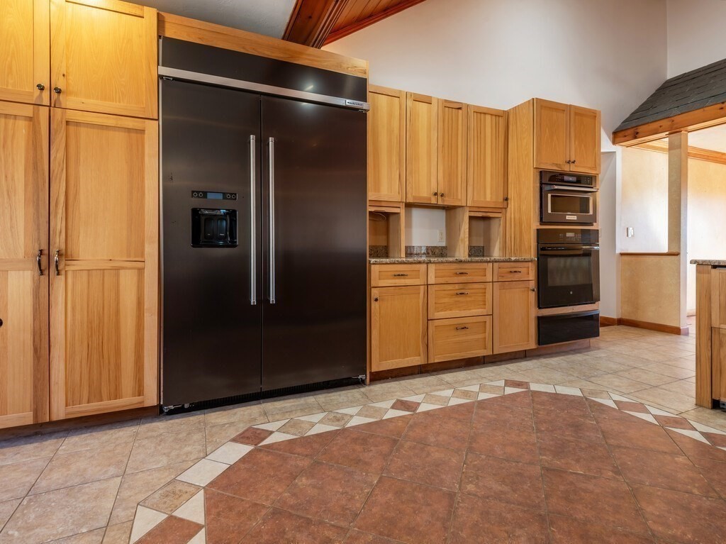4 Thurston Hill Road Rutland, MA 01543 - Photo 8 of 35 a view of kitchen with refrigerator cabinets and a window
