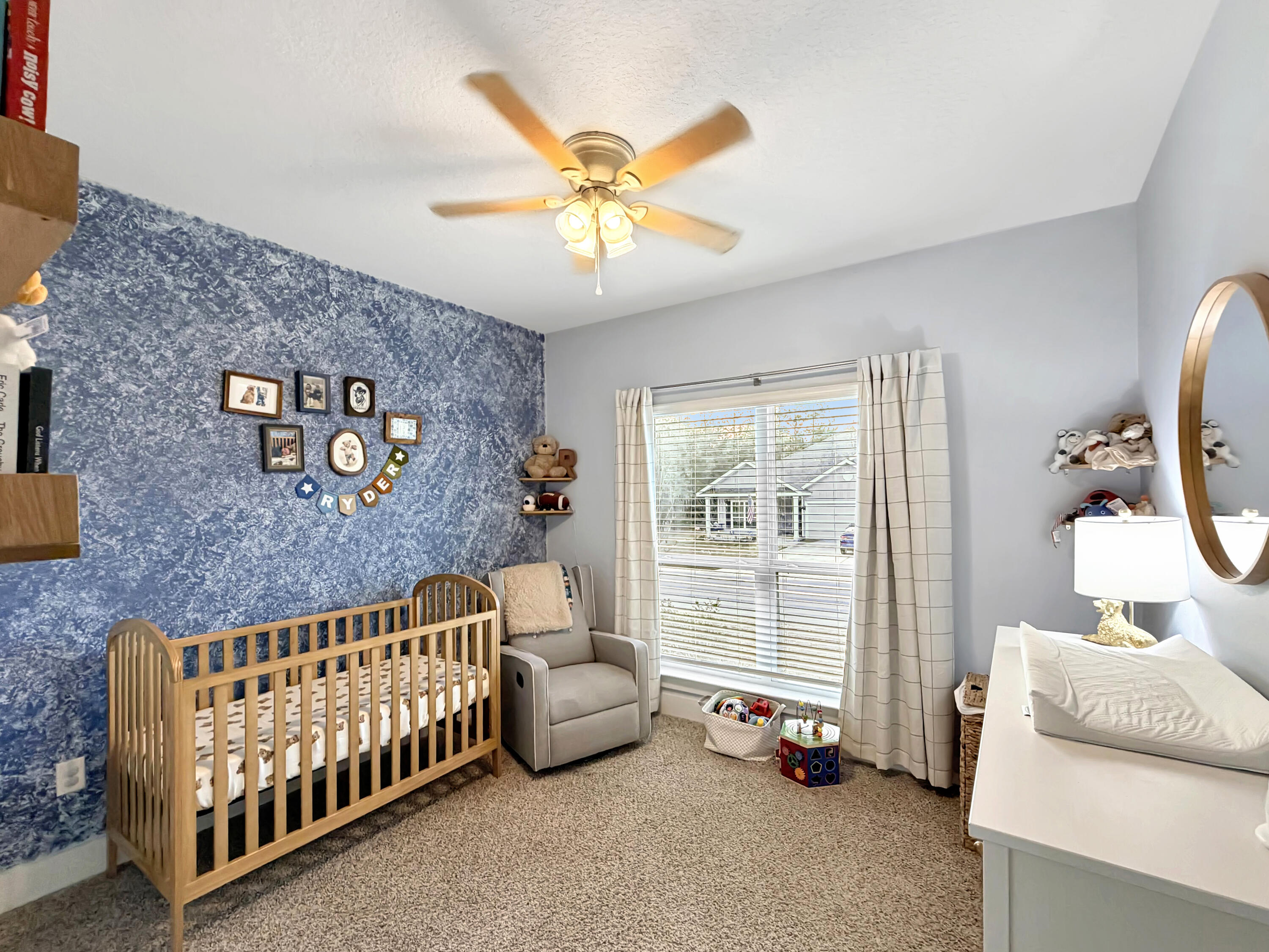 2456 Dakota Way Crestview, FL 32536 - Photo 20 of 38 a bedroom with a bed and a window