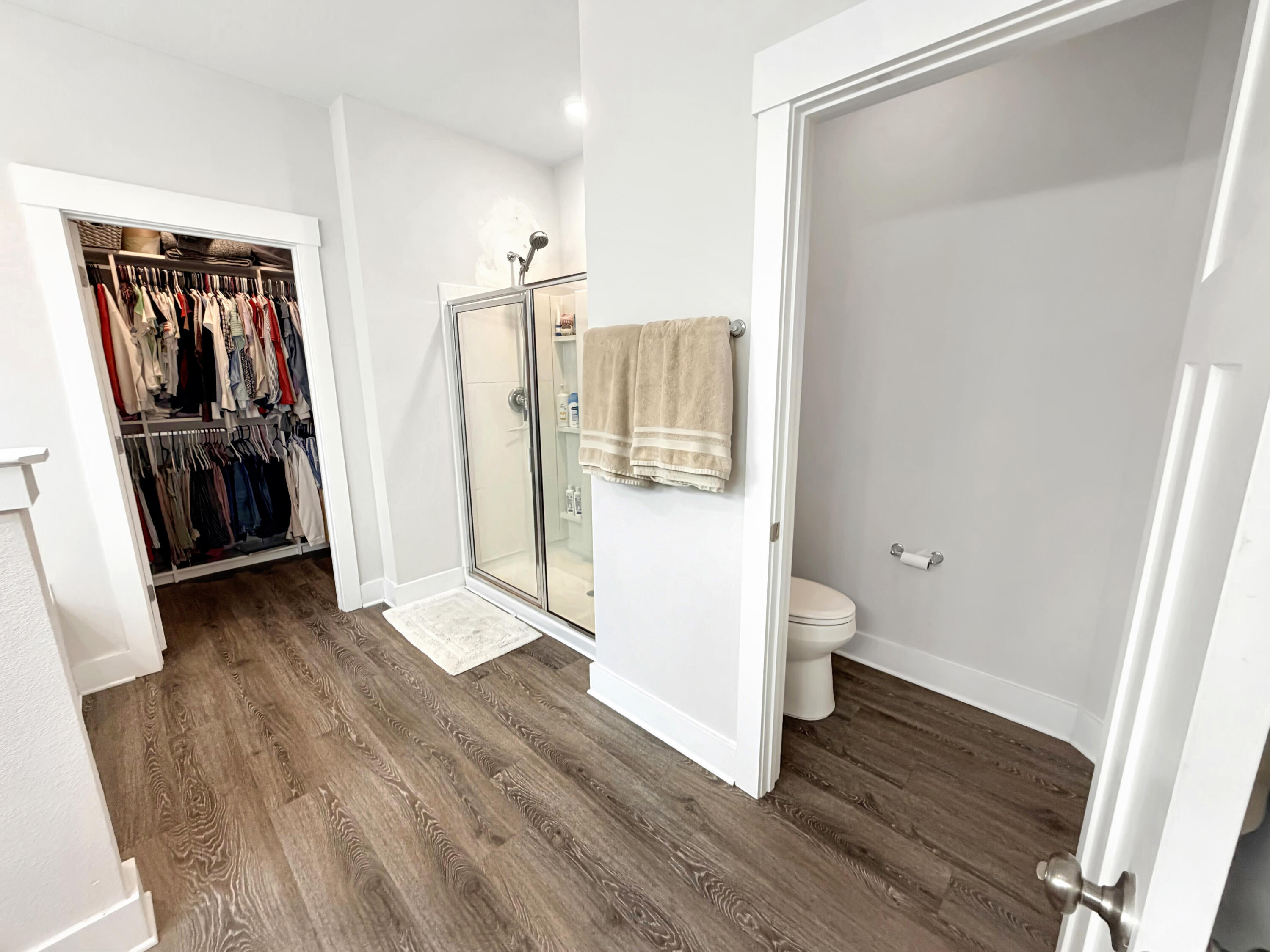 2456 Dakota Way Crestview, FL 32536 - Photo 25 of 38 a view of a hallway with wooden floor and workspace