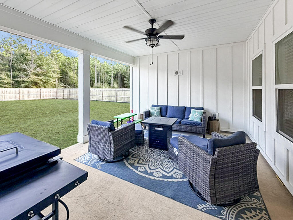 2456 Dakota Way Crestview, FL 32536 - Photo 28 of 38 a living room with furniture and a large window