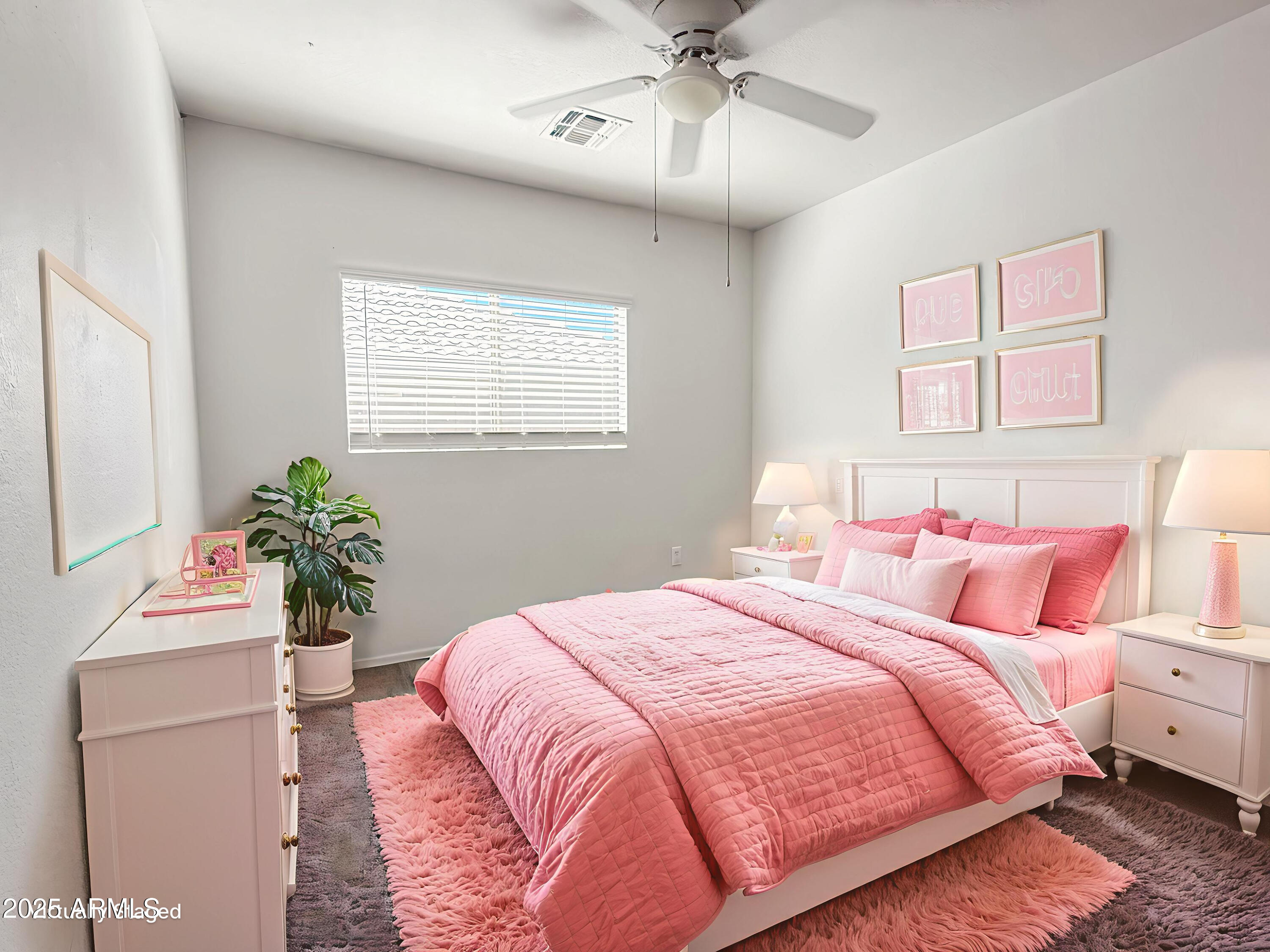 1042 South Clancy Circle Mesa, AZ 85208 - Photo 11 of 14 a bedroom with a bed and a chandelier