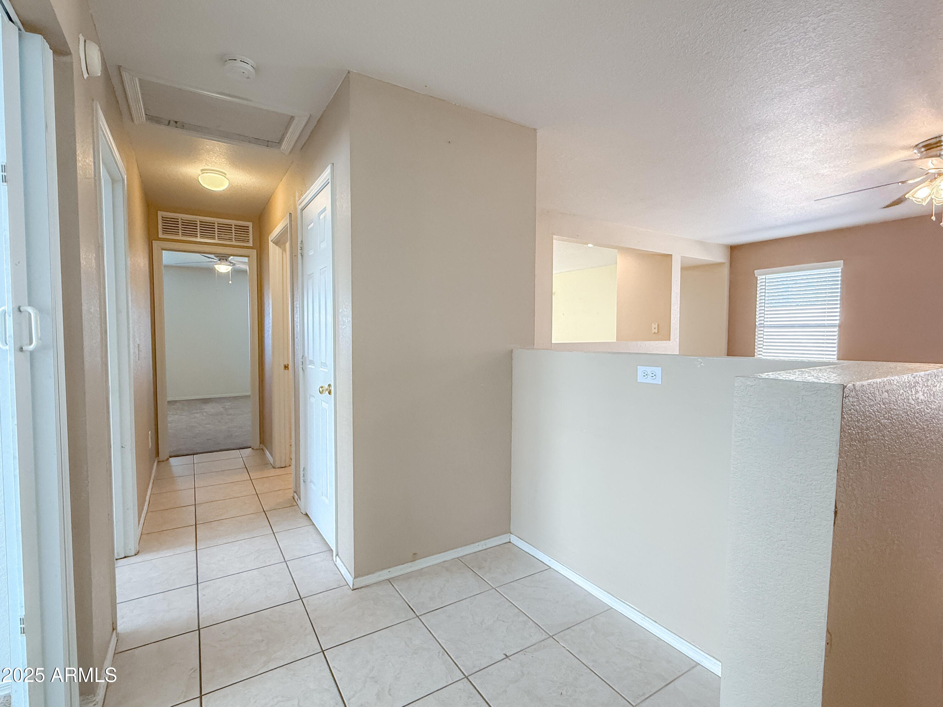 1042 South Clancy Circle Mesa, AZ 85208 - Photo 9 of 14 a view of a hallway