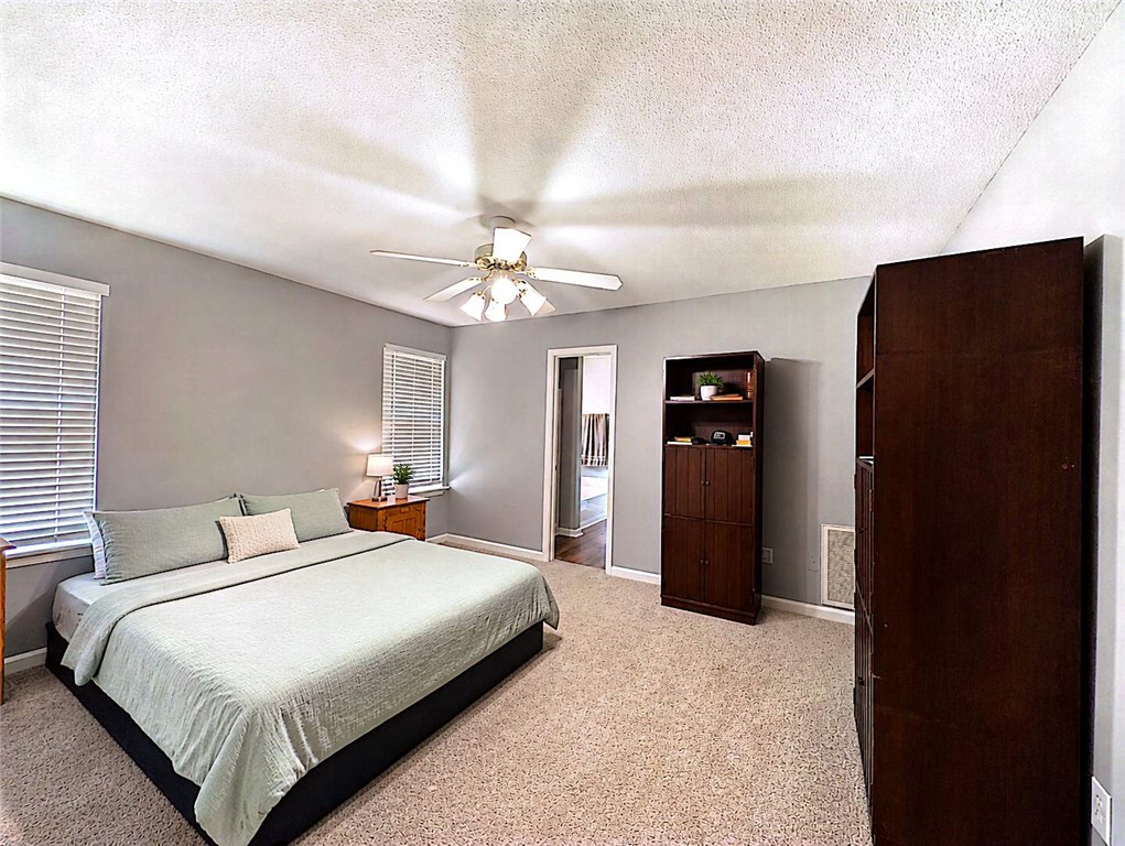 124 Woodbridge Court Anderson, SC 29621 - Photo 10 of 15 This cozy bedroom features comfortable flooring and ample natural light, perfect for relaxation.