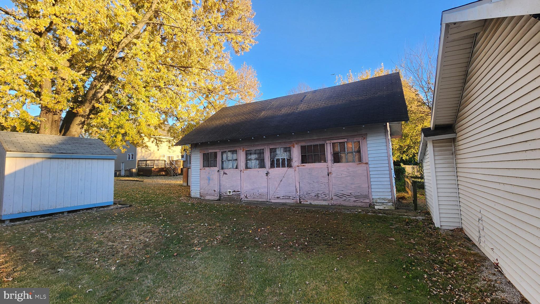 306 Richey Avenue Oaklyn, NJ 08107 - Photo 4 of 6 a front view of a house with a garden