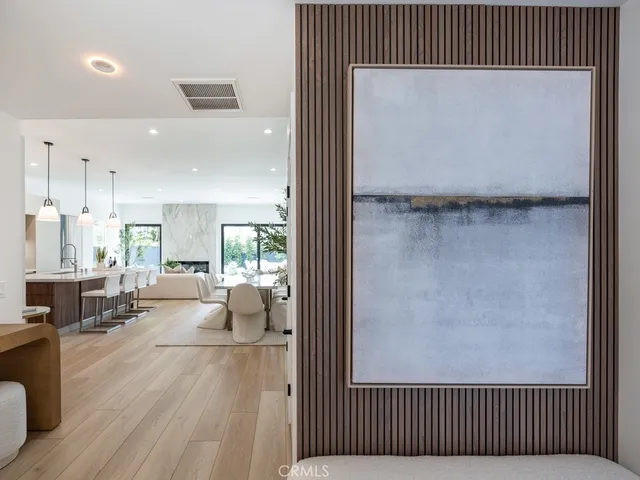 a kitchen with stainless steel appliances granite countertop a stove a sink dishwasher and a wooden cabinets