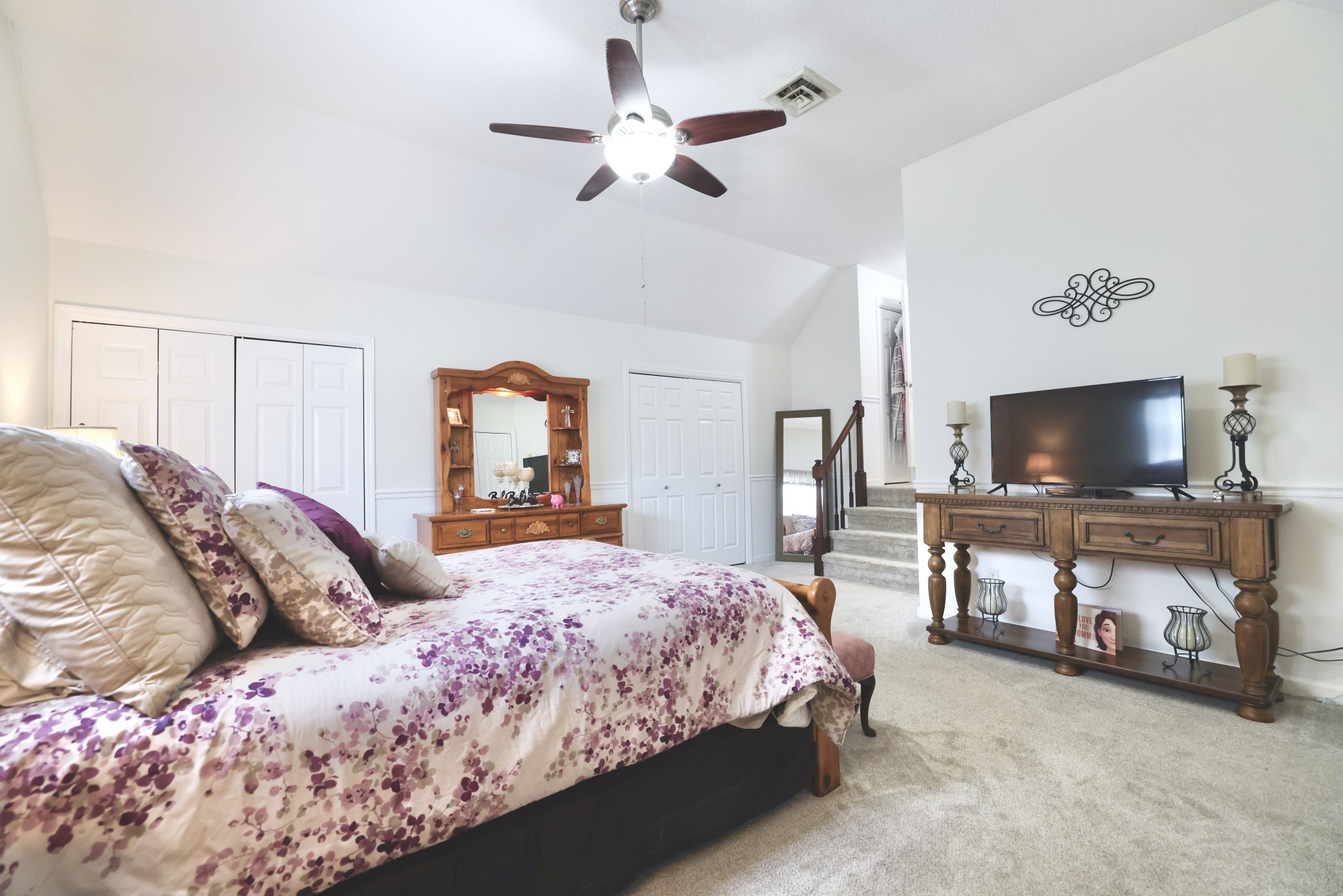 1809 Hidden Ridge Circle Mount Juliet, TN 37122 - Photo 21 of 45 a bedroom with a bed and a flat screen tv