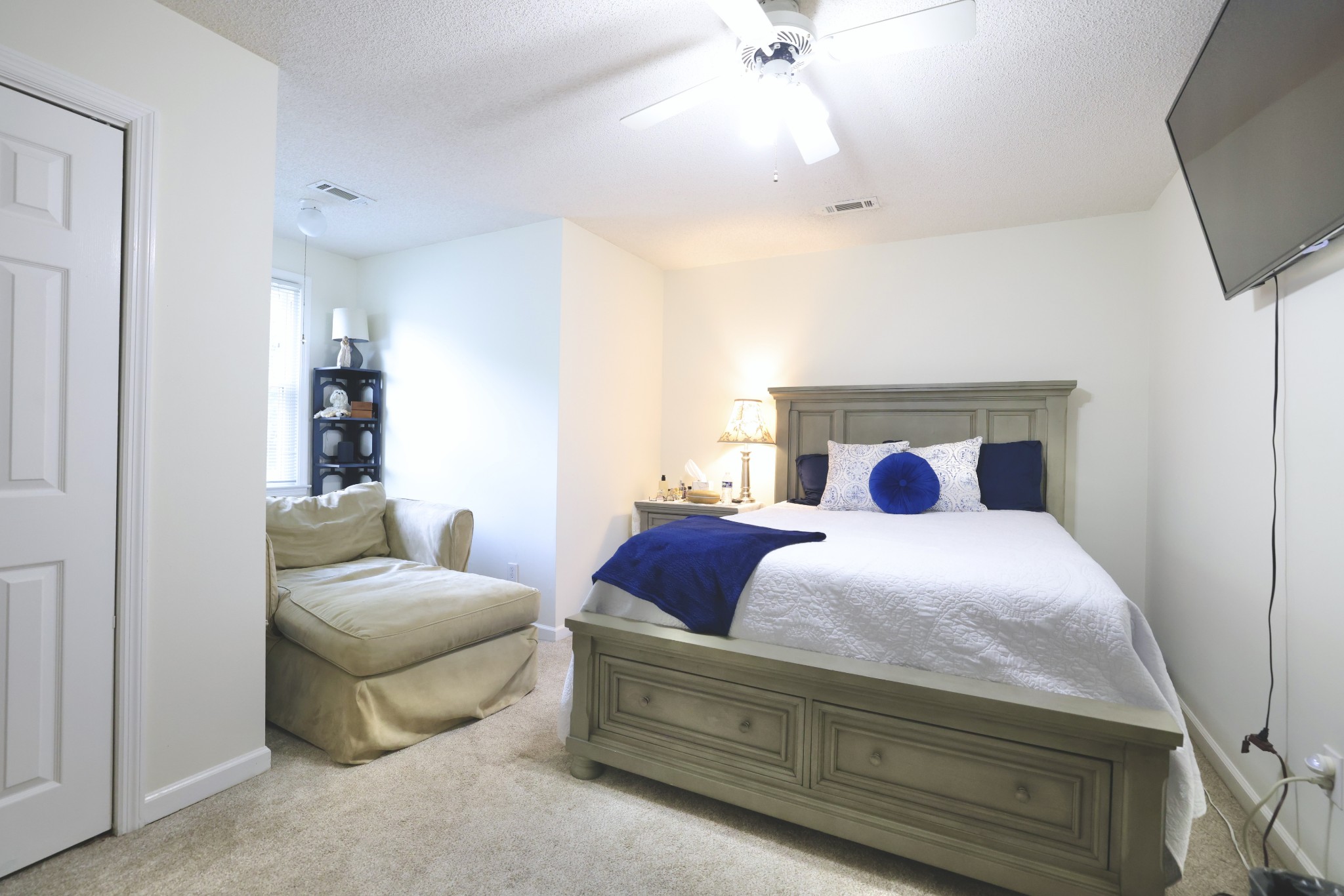 1809 Hidden Ridge Circle Mount Juliet, TN 37122 - Photo 24 of 45 a bedroom with a bed and a couch