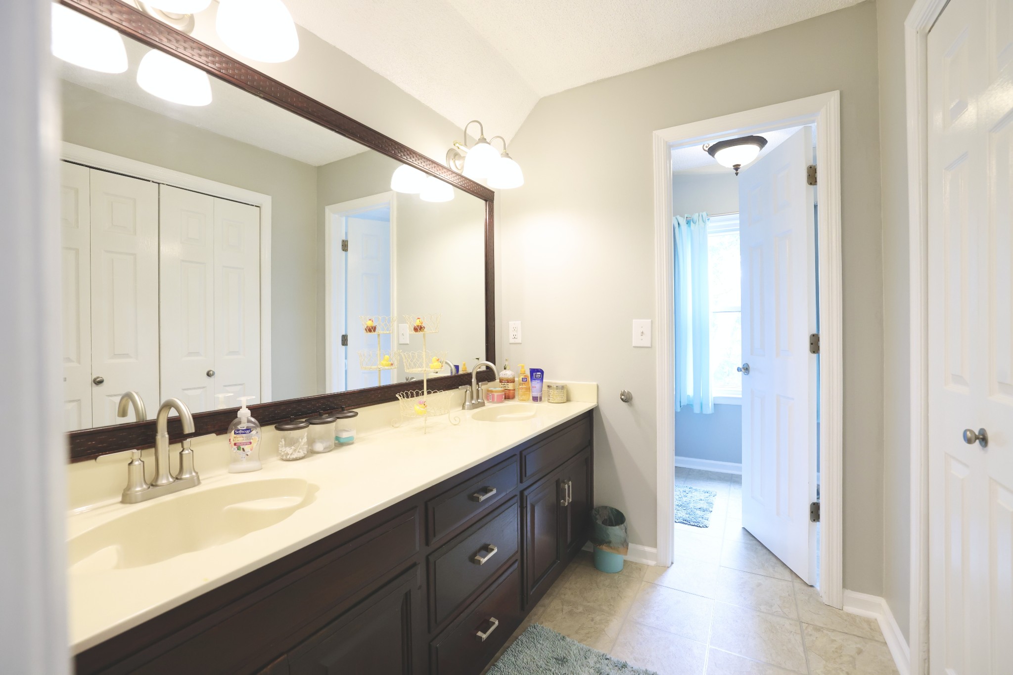1809 Hidden Ridge Circle Mount Juliet, TN 37122 - Photo 26 of 45 a bathroom with a sink double vanity and a mirror