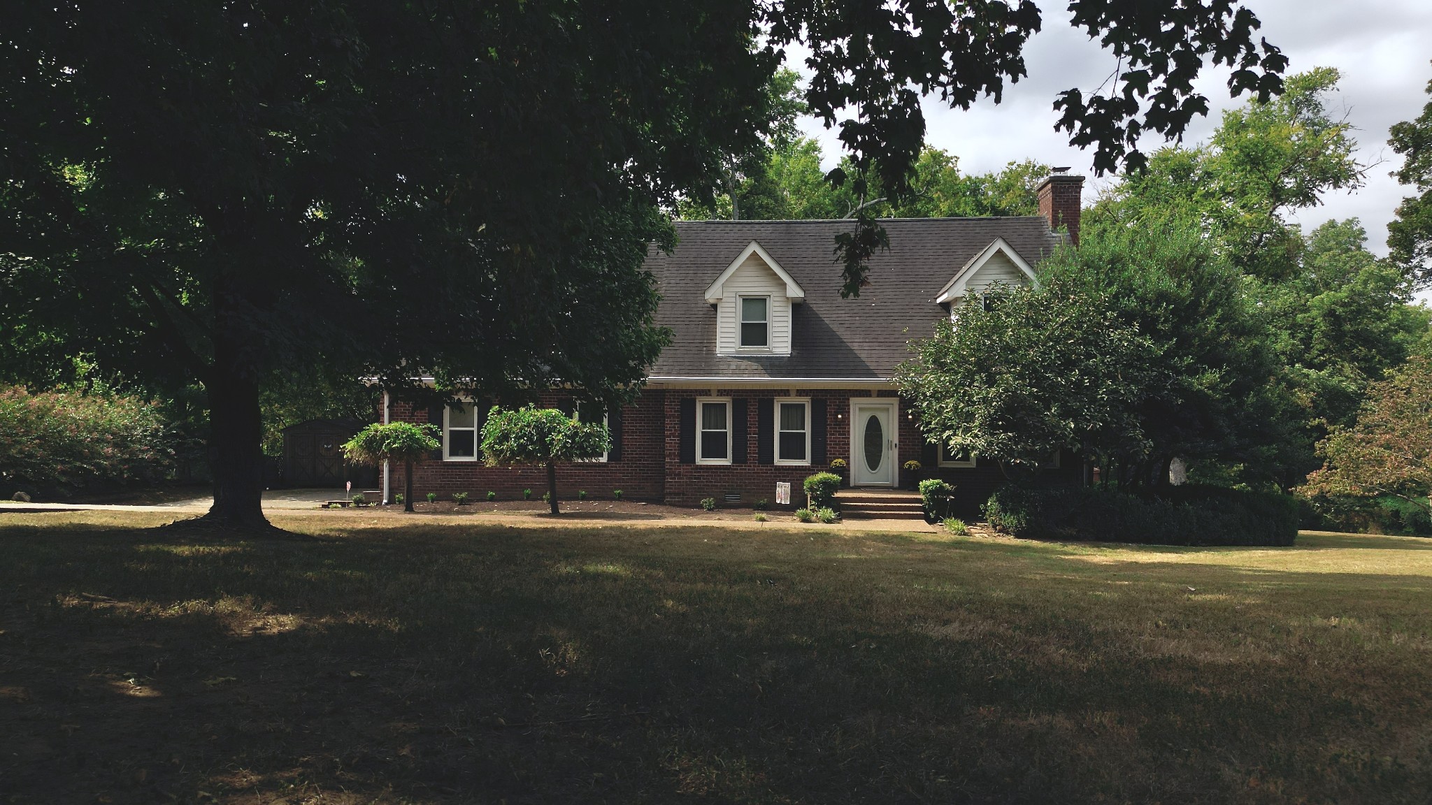 1809 Hidden Ridge Circle Mount Juliet, TN 37122 - Photo 5 of 45 a front view of a house with a yard