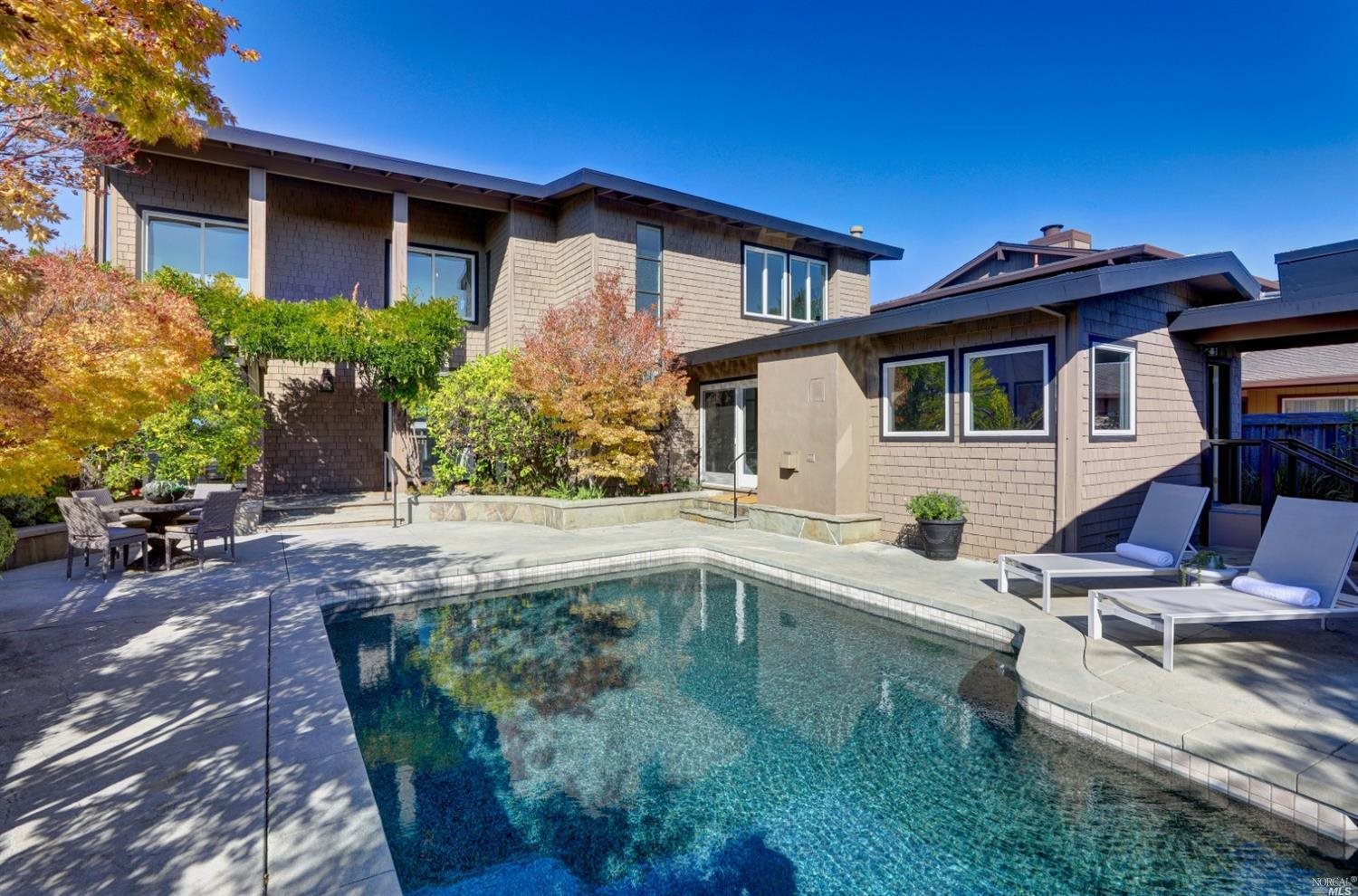 242 Riviera Circle Larkspur, CA 94939 - Photo 1 of 1 a front view of house with yard and outdoor seating