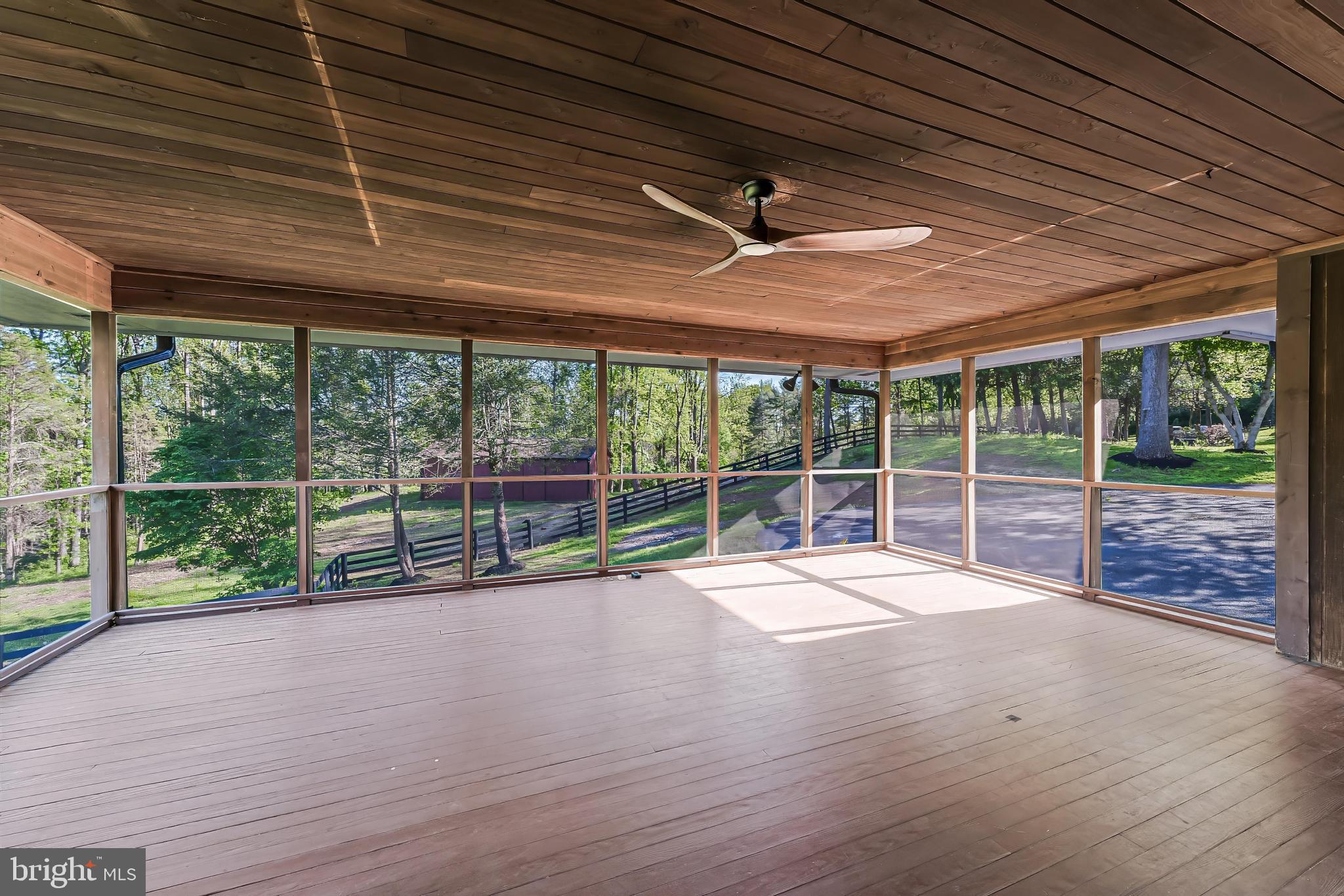 6891 Wilson Road Marshall, VA 20115 - Photo 100 of 118 Serene screened porch with nature views.
