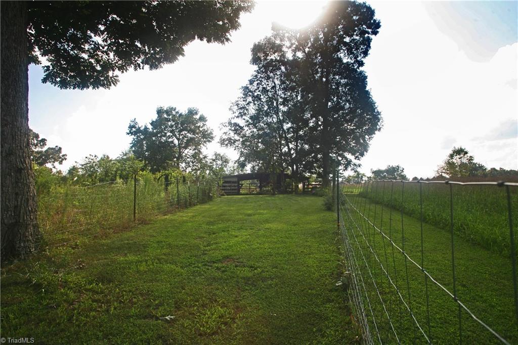 742 Murray Road Elkin, NC 28621 - Photo 10 of 14 Property includes feed stable, tractor shed and some fencing.