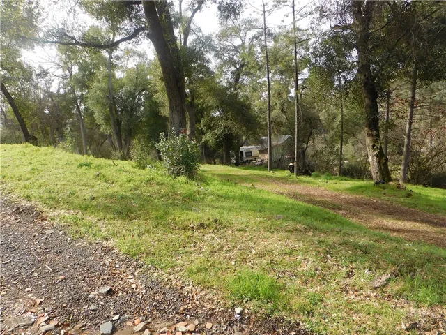 a fire hydrant in the middle of a field