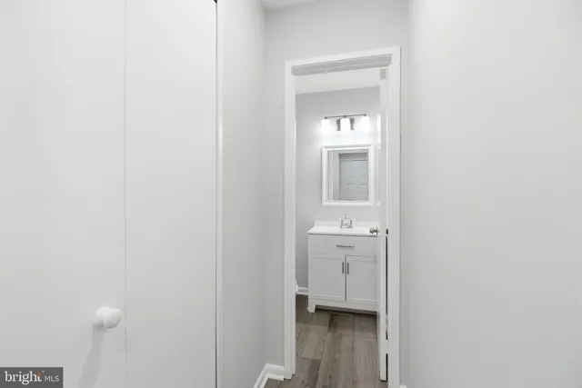 a view of a bathroom from the hallway
