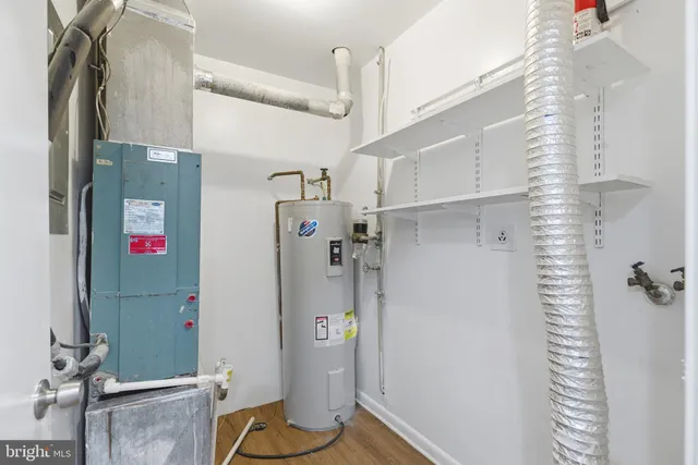 a bathroom with a shower and a toilet