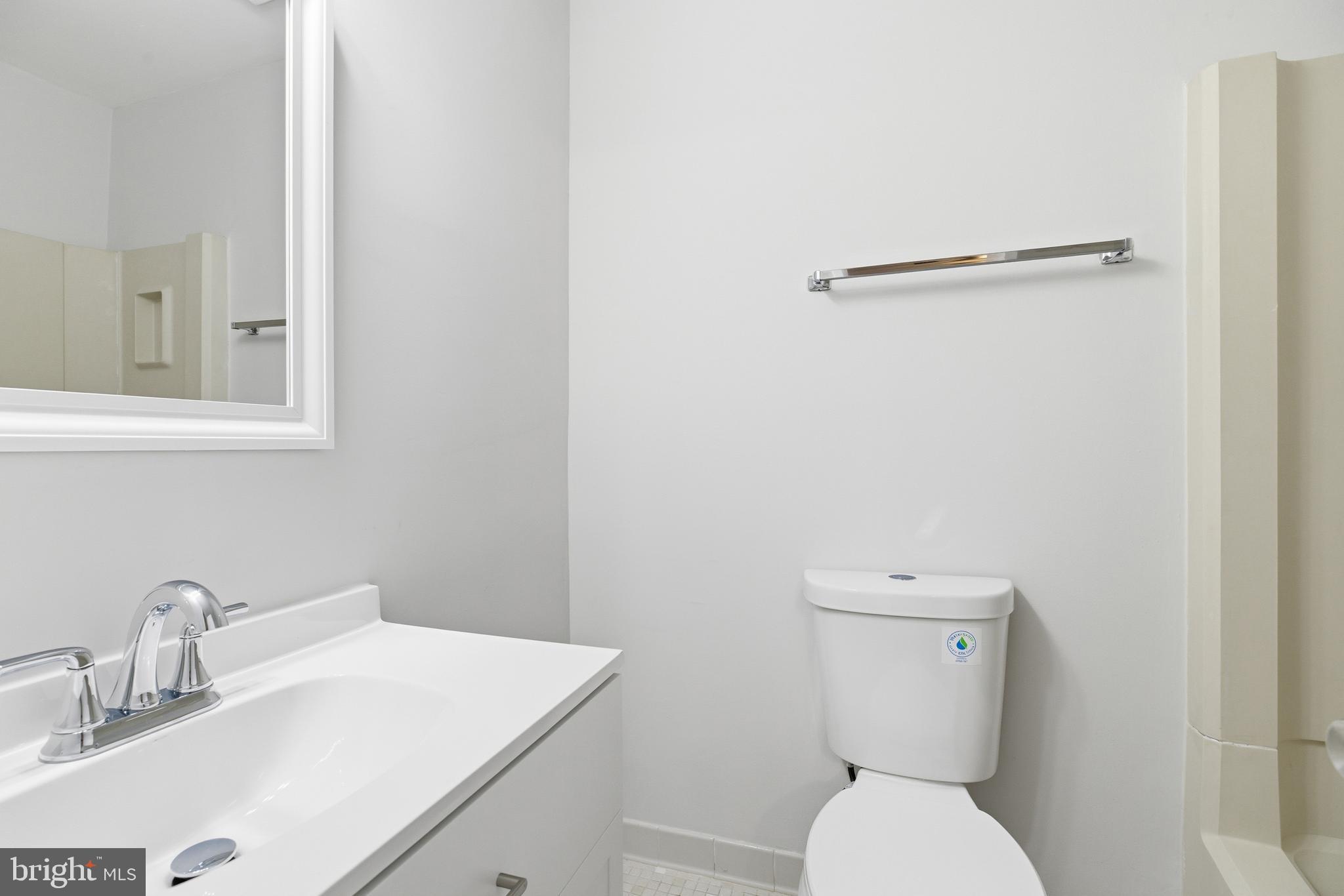 2006 Headlands Circle Reston, VA 20191 - Photo 20 of 29 a bathroom with a toilet sink and mirror