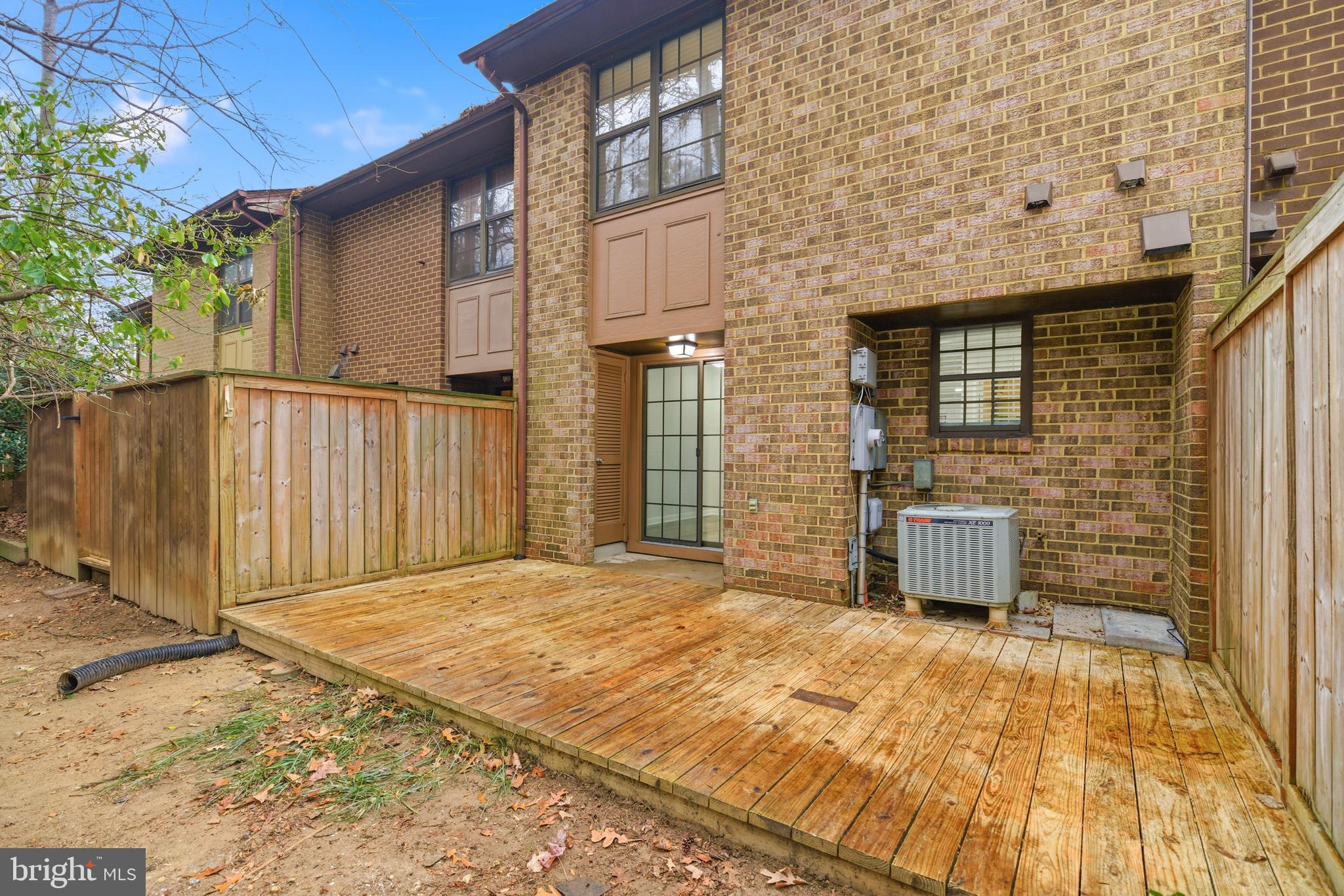 2006 Headlands Circle Reston, VA 20191 - Photo 28 of 29 a brick house with a outdoor space