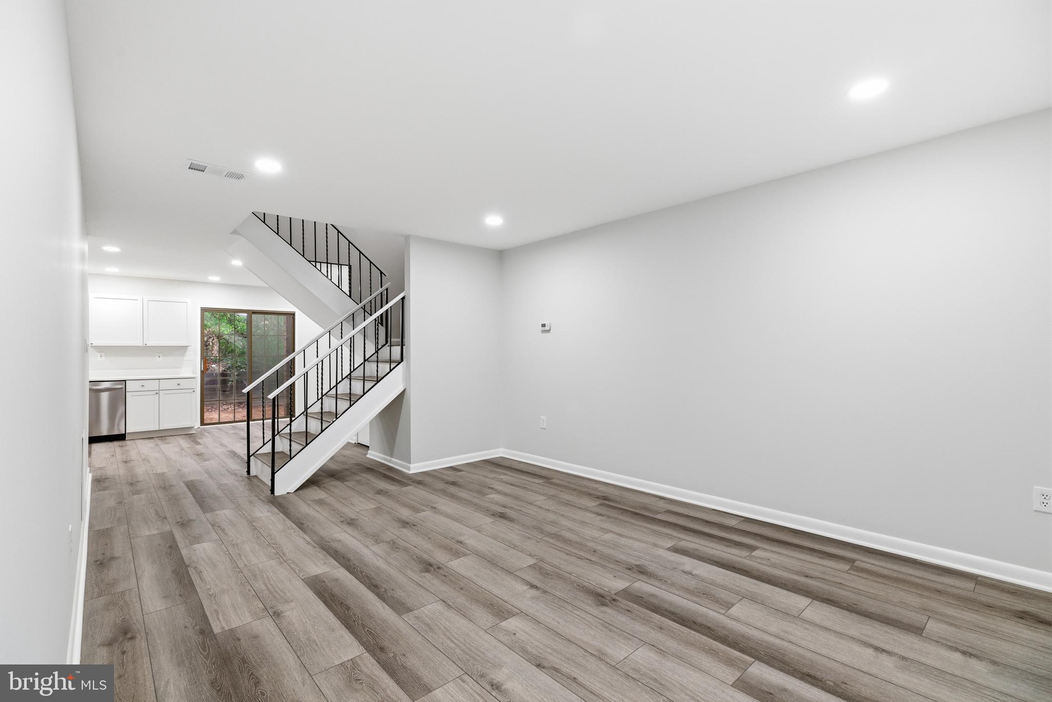 2006 Headlands Circle Reston, VA 20191 - Photo 4 of 29 a view of an entryway with wooden floor