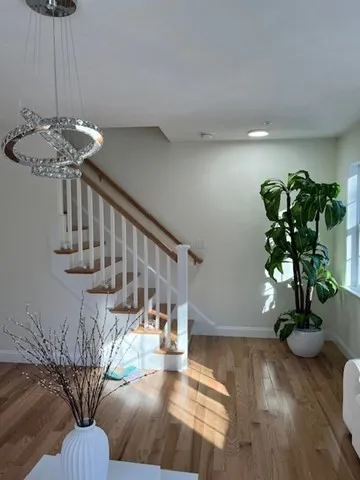 a vase of flowers sitting on a table