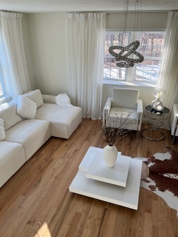 35 Fredonian Street, Unit K Shirley, MA 01464 - Photo 6 of 18 a living room with furniture and a window