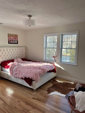 35 Fredonian Street, Unit K Shirley, MA 01464 - Photo 7 of 18 a bedroom with a bed and a window