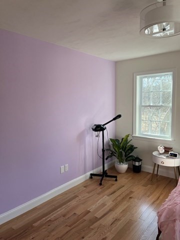 35 Fredonian Street, Unit K Shirley, MA 01464 - Photo 8 of 18 a view of entryway with wooden floor