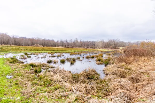 a view of beach and covered with snow