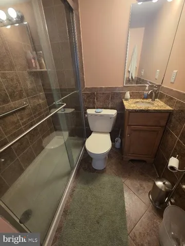 a bathroom with a toilet and a sink