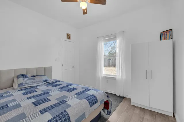 a view of a bedroom with closet