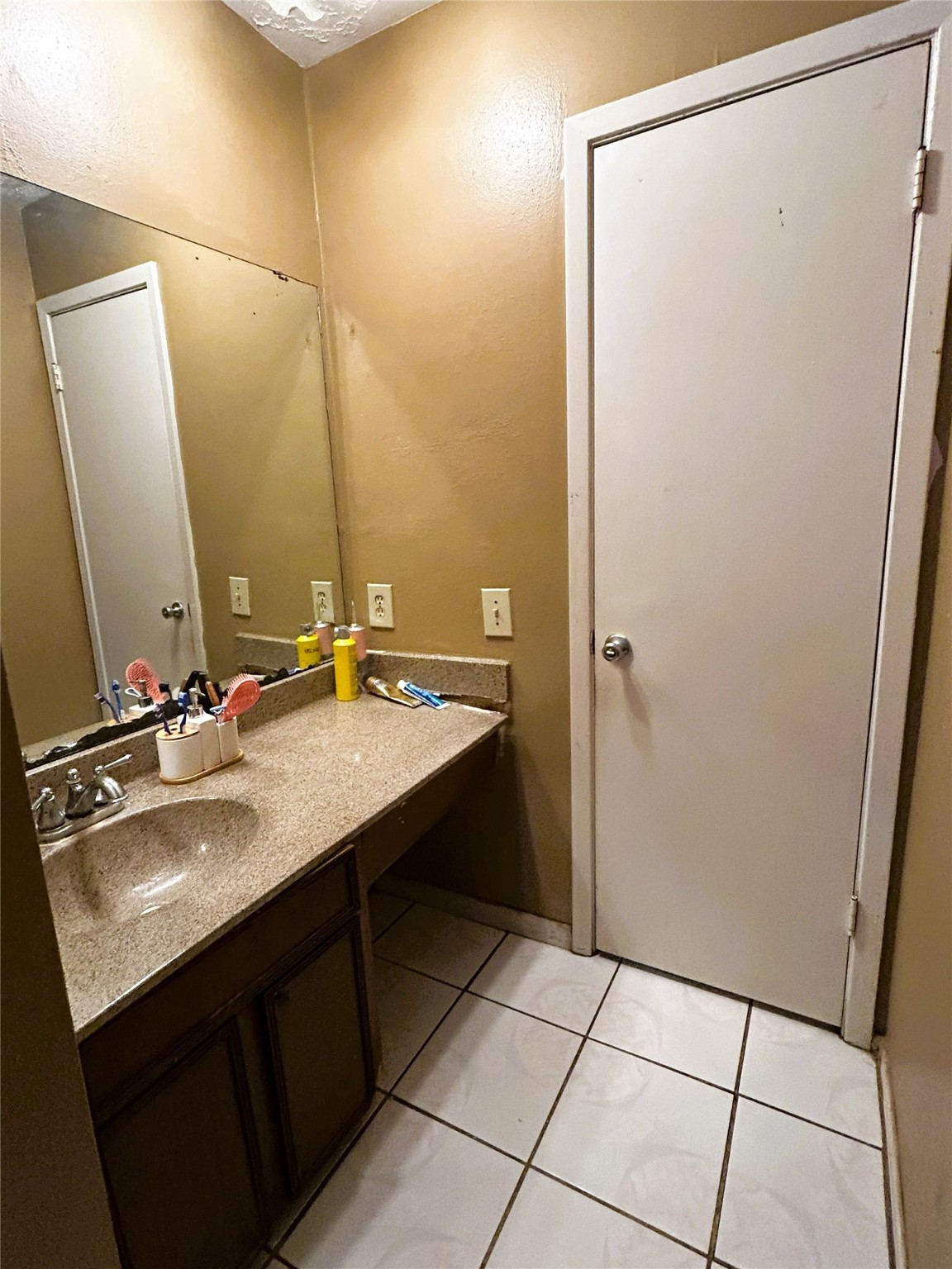 4330 Tylergate Drive Spring, TX 77373 - Photo 14 of 25 a bathroom with a sink and a mirror