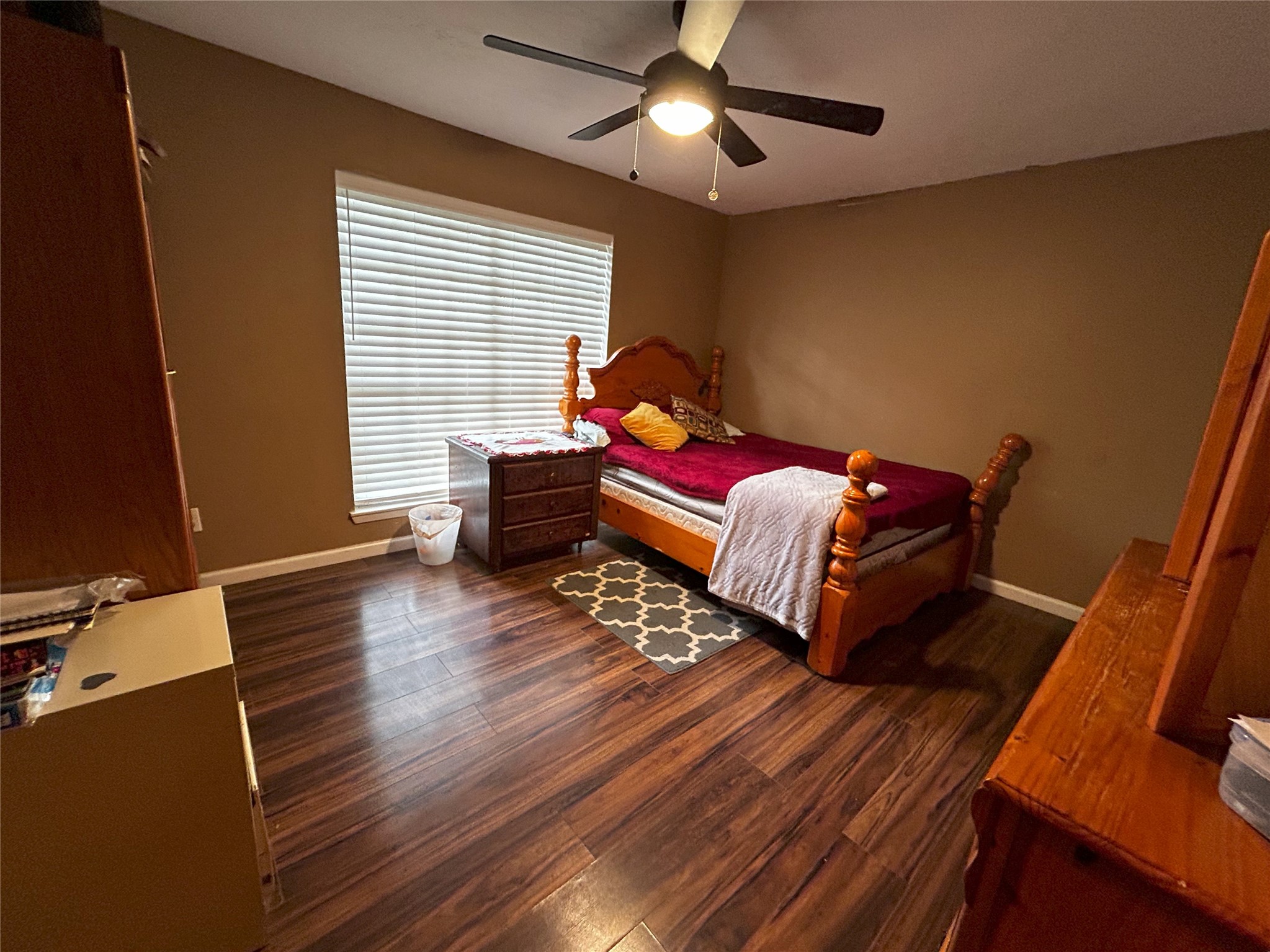 4330 Tylergate Drive Spring, TX 77373 - Photo 17 of 25 a living room with furniture and a wooden floor