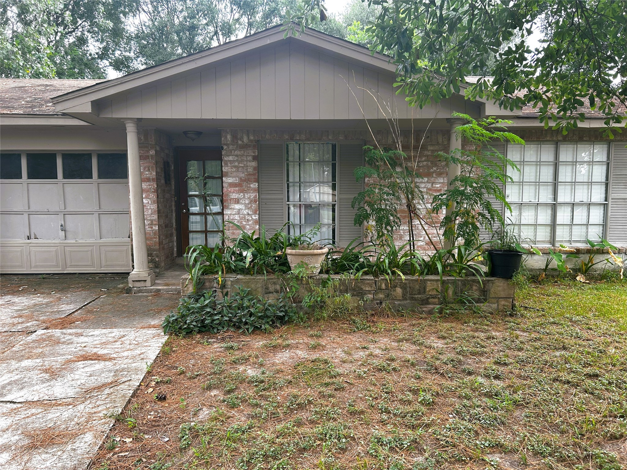 4330 Tylergate Drive Spring, TX 77373 - Photo 2 of 25 a front view of a house with garden