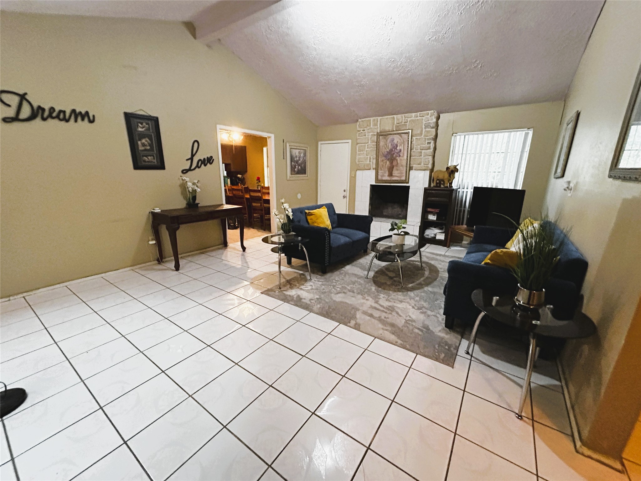 4330 Tylergate Drive Spring, TX 77373 - Photo 8 of 25 a living room with furniture and a fireplace