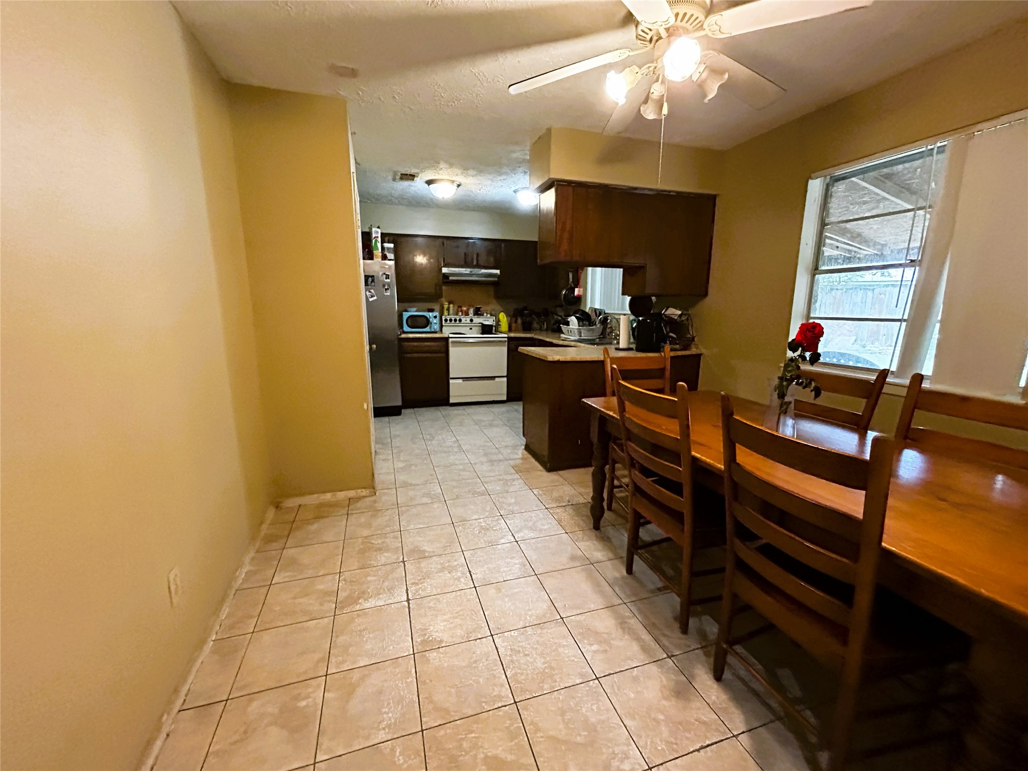 4330 Tylergate Drive Spring, TX 77373 - Photo 9 of 25 a kitchen with a sink cabinets and appliances