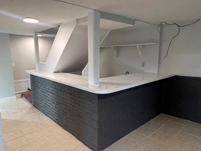 a house with white door of garage