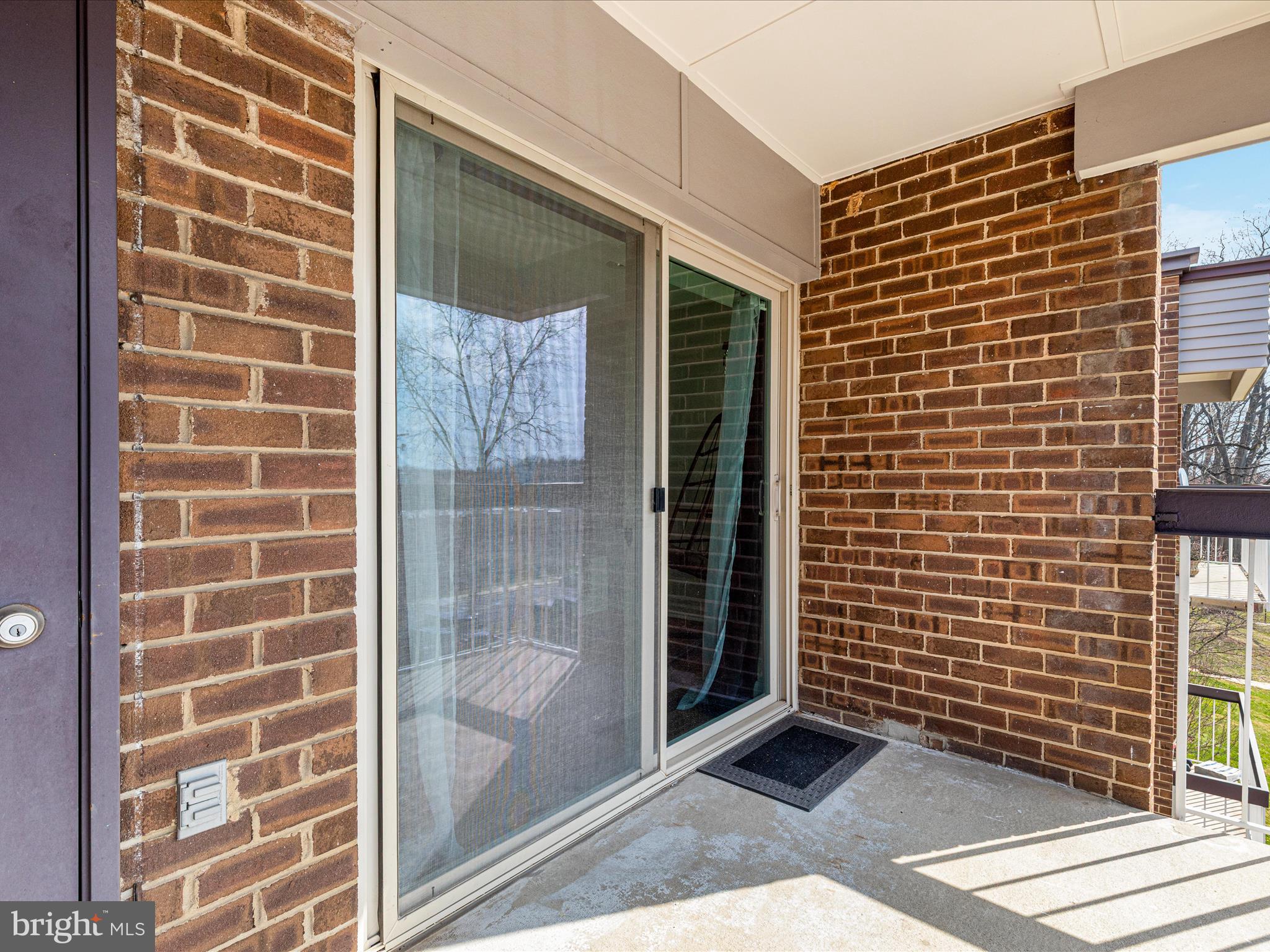 2303 Greenery Lane, Unit 2034 Silver Spring, MD 20906 - Photo 24 of 30 a view of a brick building