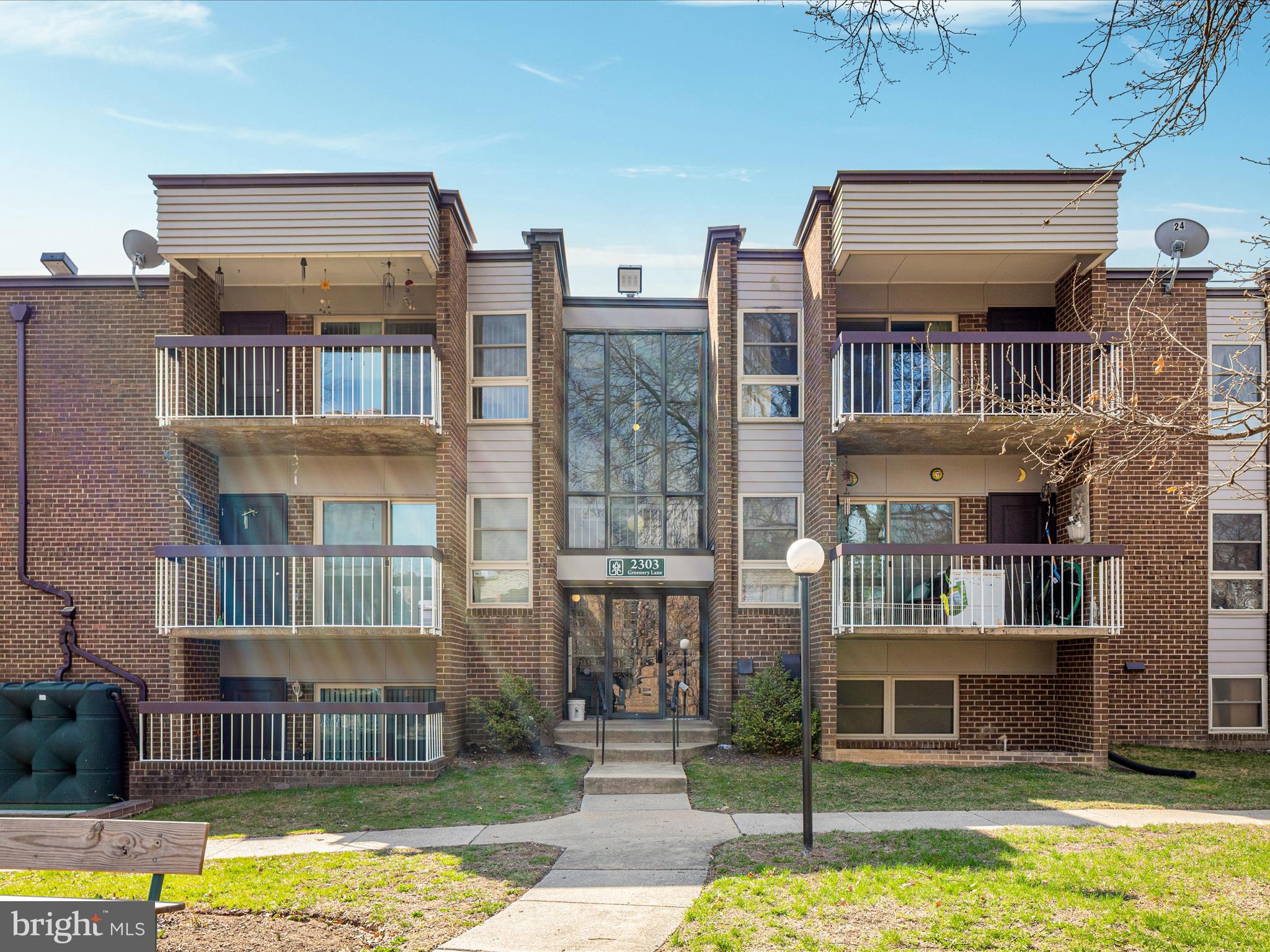 2303 Greenery Lane, Unit 2034 Silver Spring, MD 20906 - Photo 25 of 30 a front view of a building with a swimming pool