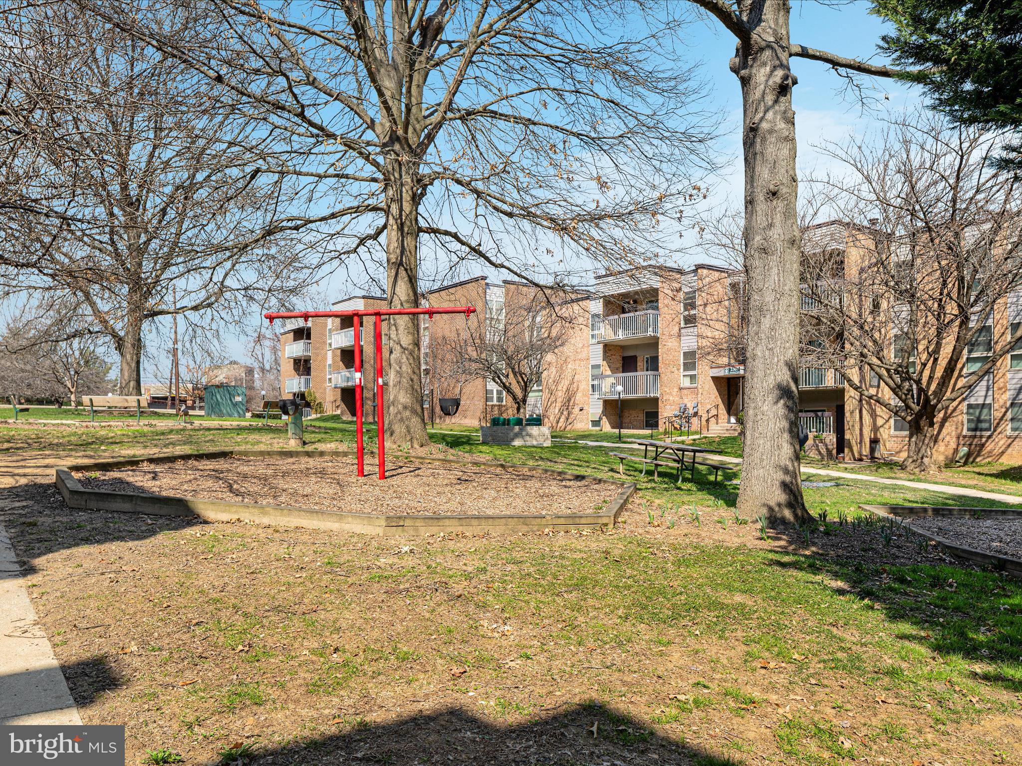 2303 Greenery Lane, Unit 2034 Silver Spring, MD 20906 - Photo 27 of 30 a view of a park with large trees
