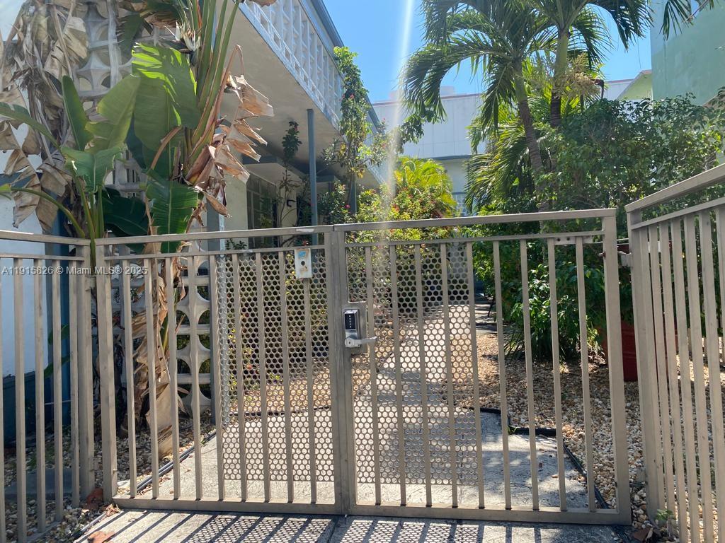 6805 Abbott Avenue, Unit 7 Miami Beach, FL 33141 - Photo 8 of 10 a view of street from balcony