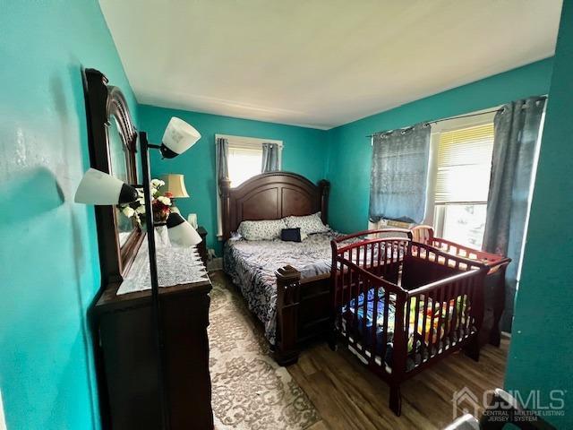 10 Romney Road Bound Brook, NJ 08805 - Photo 6 of 14 a bedroom with a bed and window