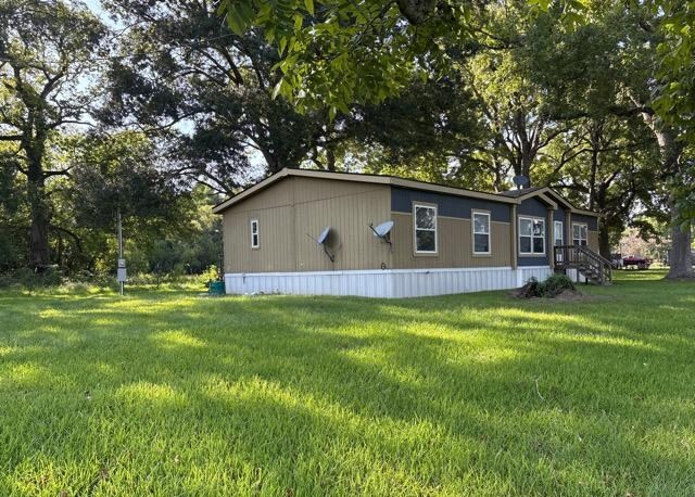 409 Fm 2830 Road North Liberty, TX 77575 - Photo 1 of 28 Gallery Image 1