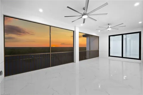 a view of a balcony with chairs