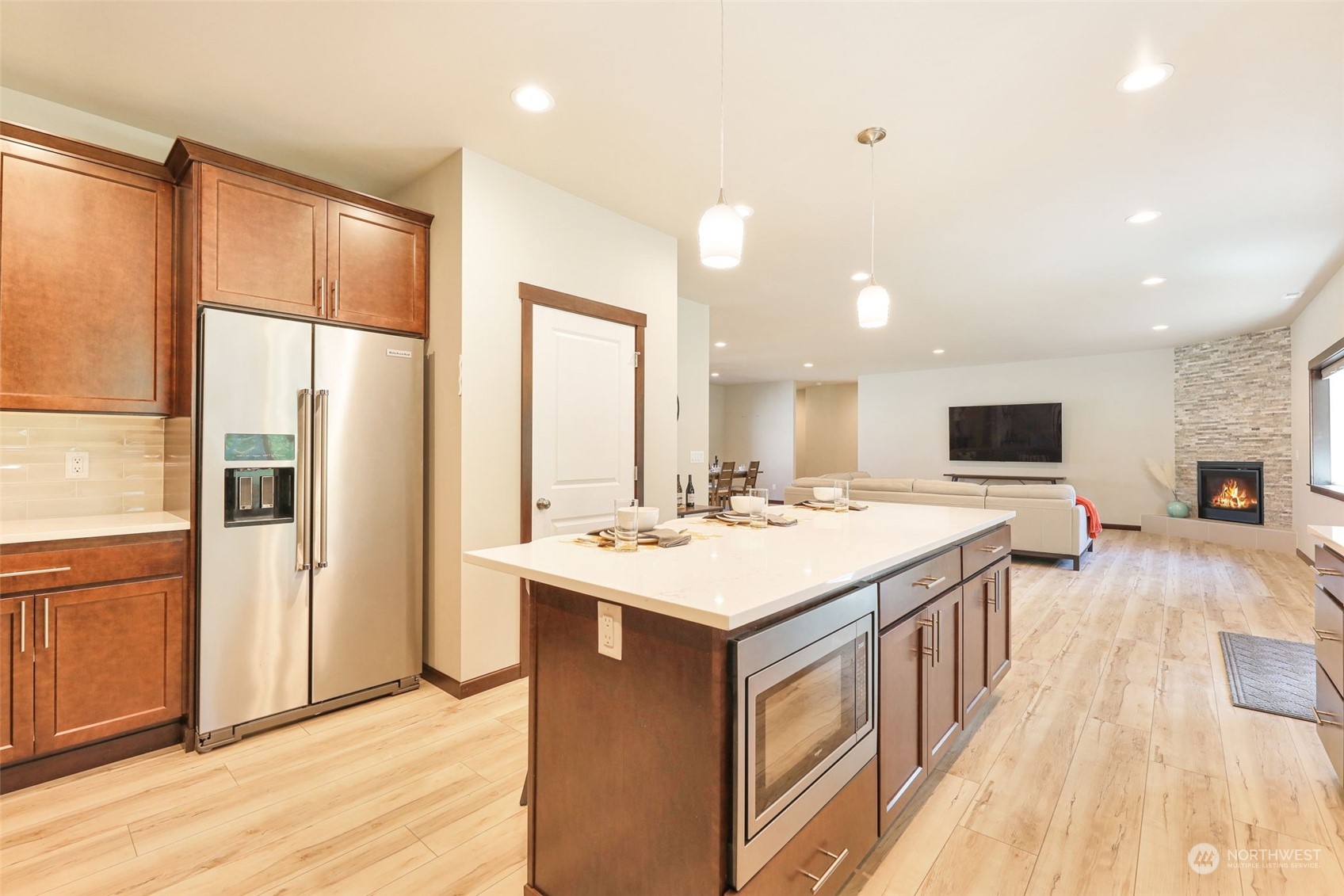 36016 Mann Road Sultan, WA 98294 - Photo 12 of 39 a large kitchen with a counter top a sink stainless steel appliances and cabinets