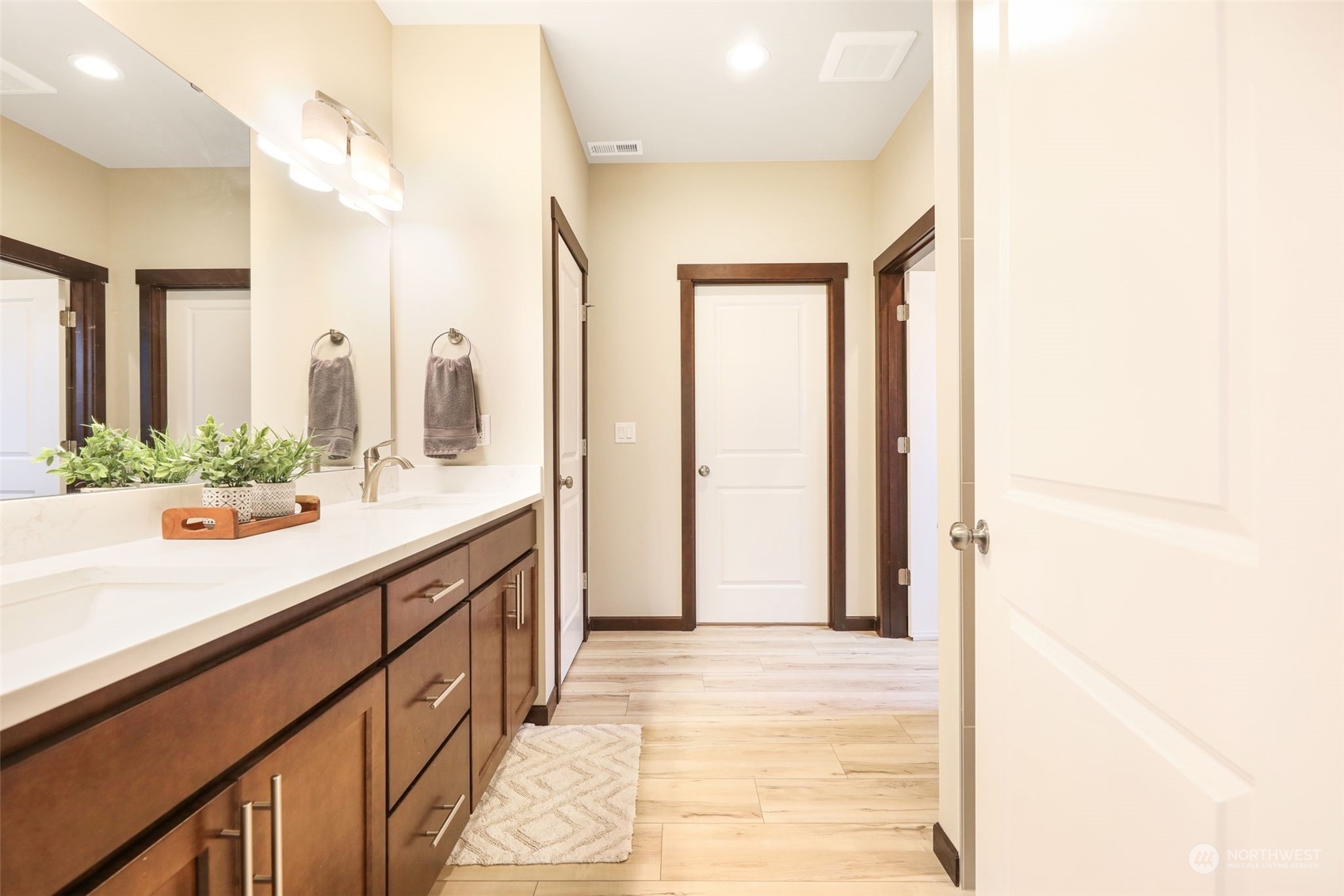 36016 Mann Road Sultan, WA 98294 - Photo 16 of 39 a bathroom with a double vanity sink and a mirror