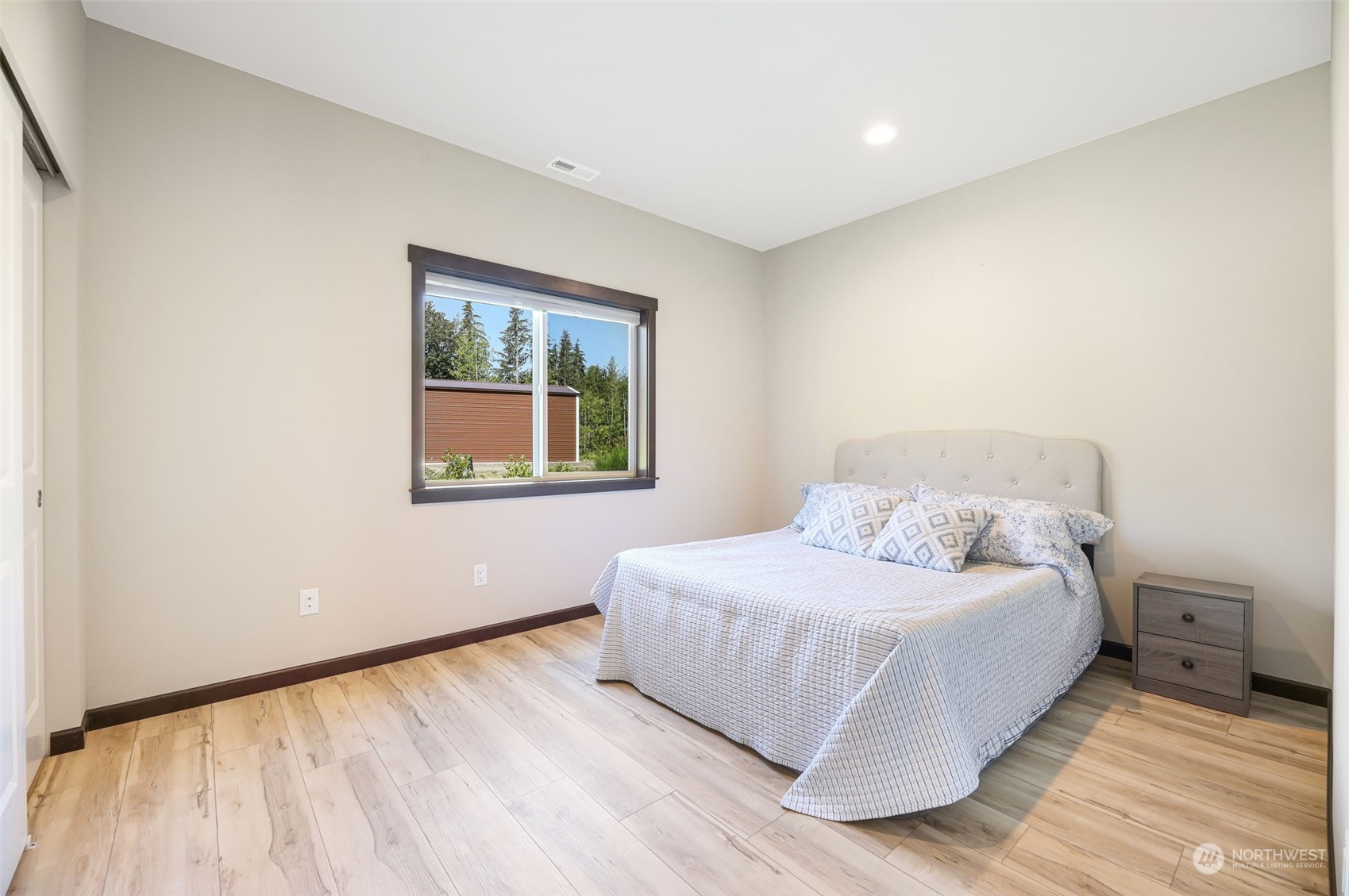 36016 Mann Road Sultan, WA 98294 - Photo 23 of 39 a bedroom with a bed and a window