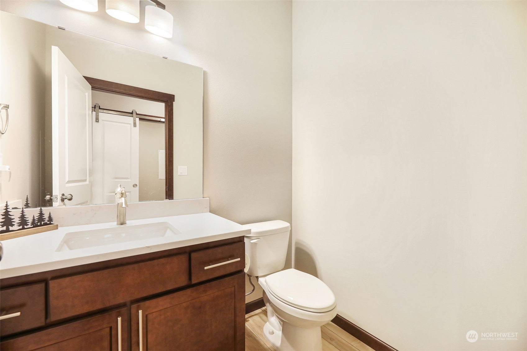 36016 Mann Road Sultan, WA 98294 - Photo 25 of 39 a bathroom with a sink a toilet and a mirror