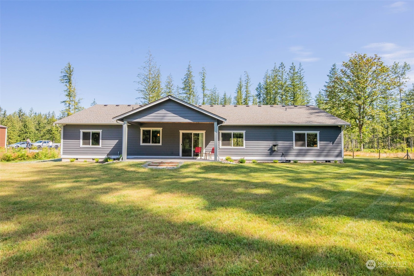 36016 Mann Road Sultan, WA 98294 - Photo 31 of 39 a front view of a house with a garden