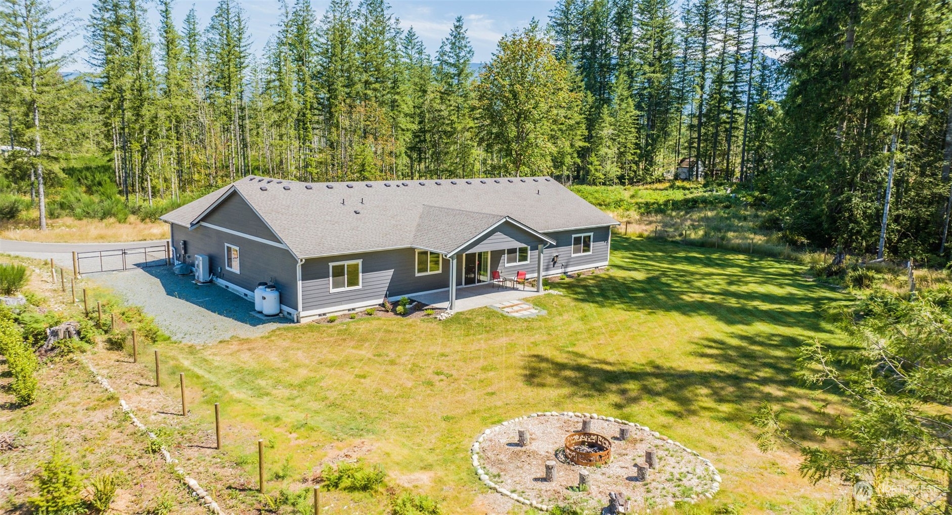 36016 Mann Road Sultan, WA 98294 - Photo 33 of 39 view of a house with a yard