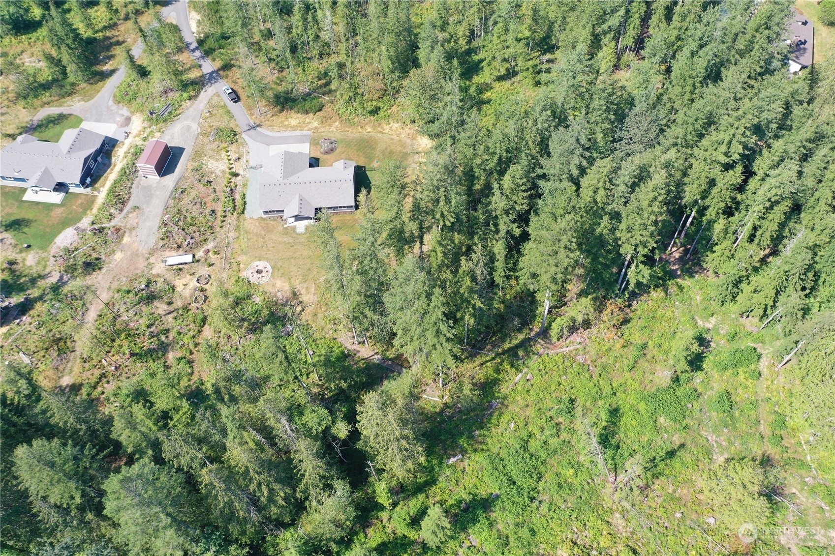 36016 Mann Road Sultan, WA 98294 - Photo 37 of 39 an aerial view of residential houses with outdoor space and trees